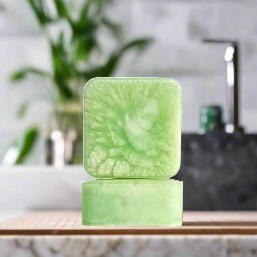 Green fresh forte soap sitting in a spa bathroom.