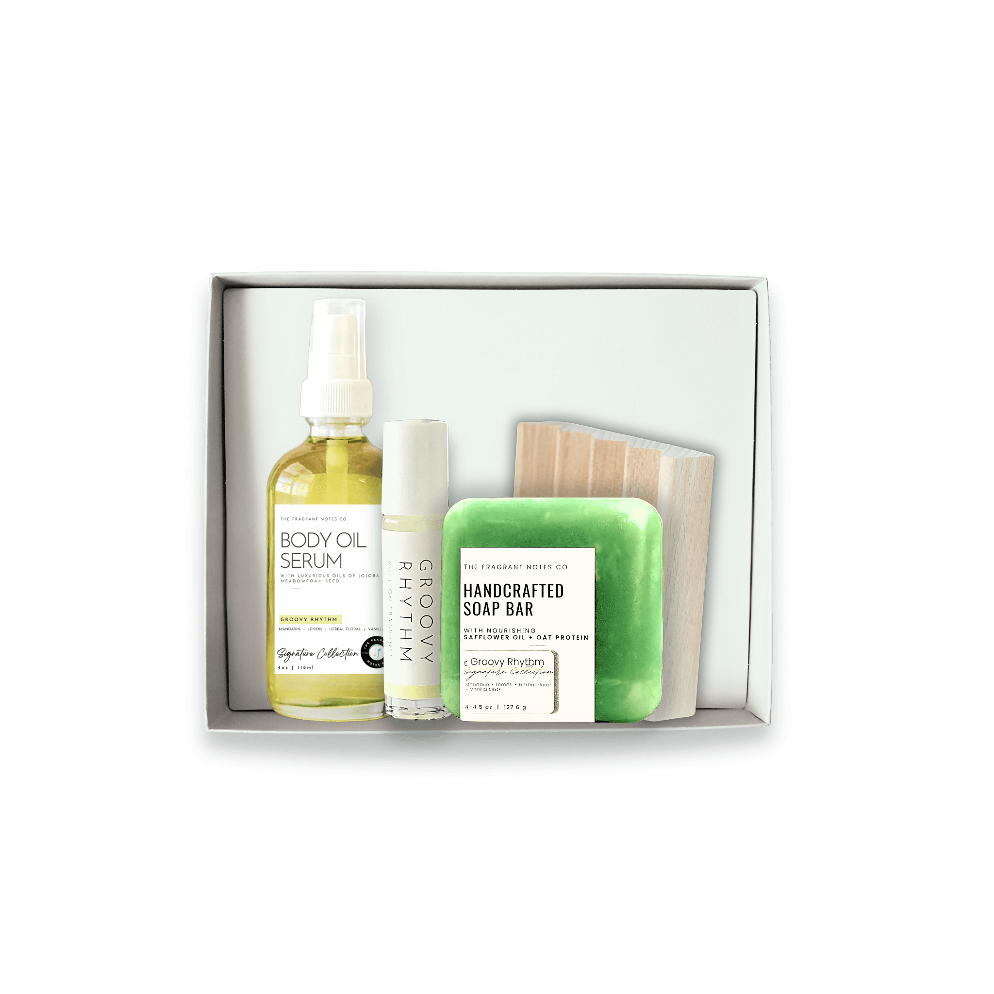 Transparent view of Groovy Rhythm's Body Care Bundle in a gift box.