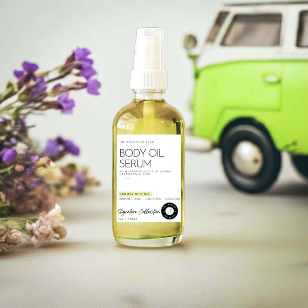 Groovy Rhythm Body Oil Serum surrounded by a green van and purple flowers.