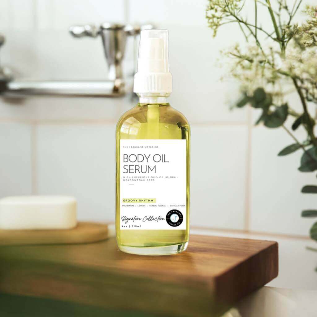 Groovy Rhythm Body Oil Serum on a wooden bathroom counter.